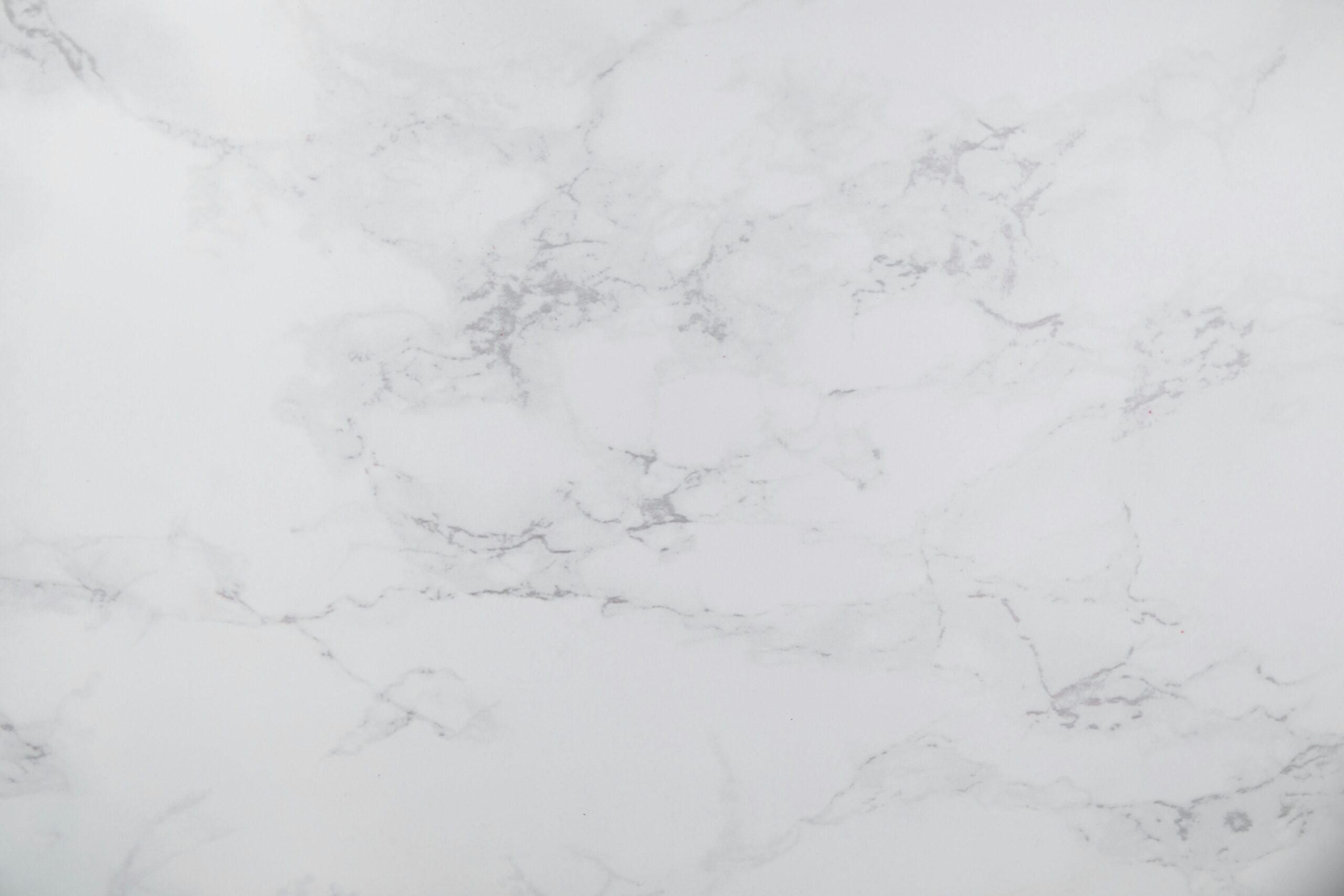 White marble texture with subtle gray veins, perfect for design backgrounds.