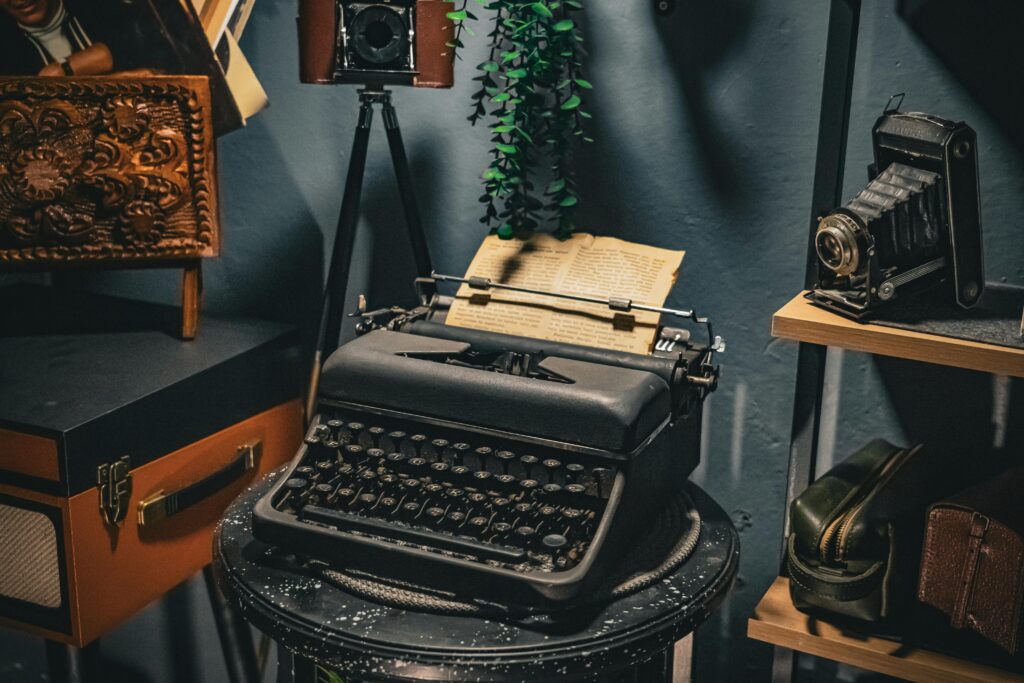A nostalgic scene featuring a vintage typewriter, antique camera, and classic decor.