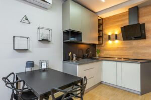 Stylish and modern kitchen interior with contemporary decor and lighting.